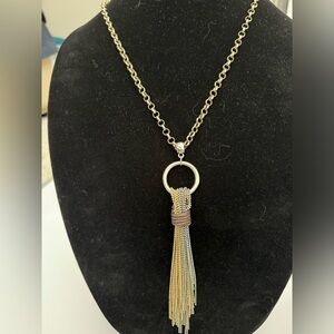 Long tassel gold tone necklace